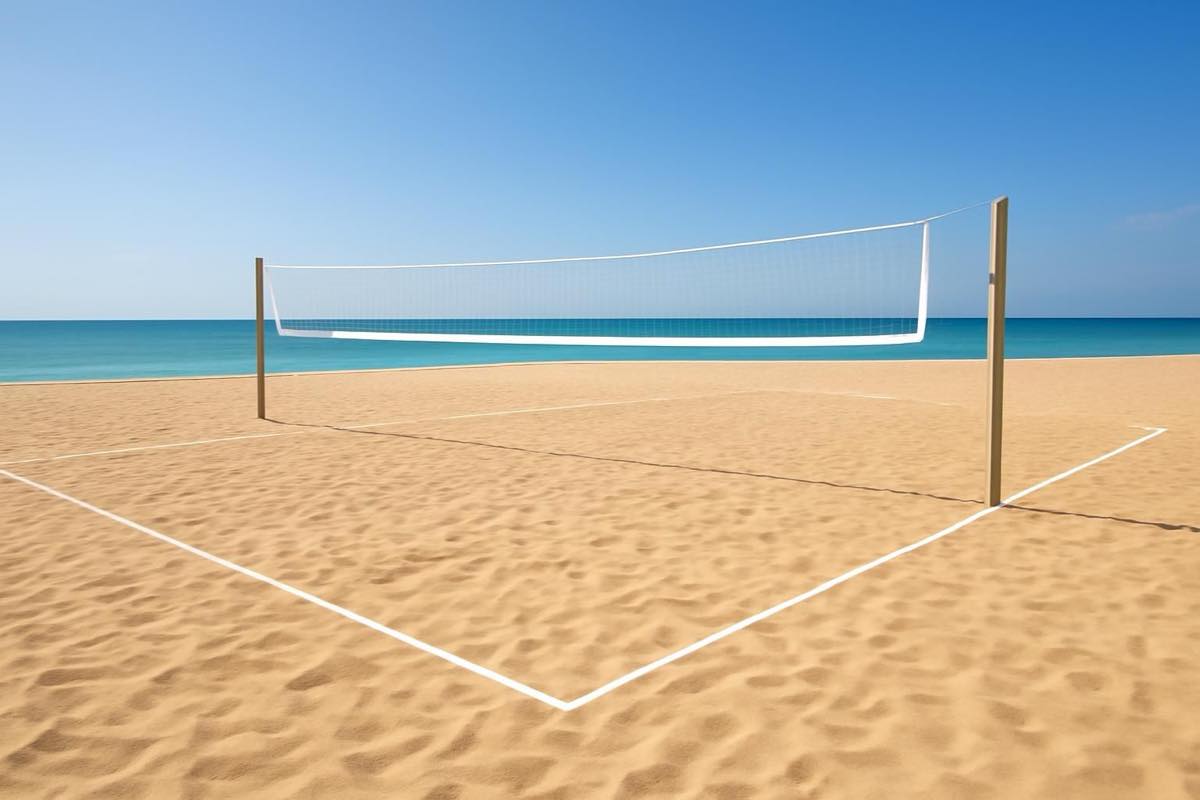 Quadra oficial de vôlei de praia com linhas demarcadas e área de segurança ampliada
